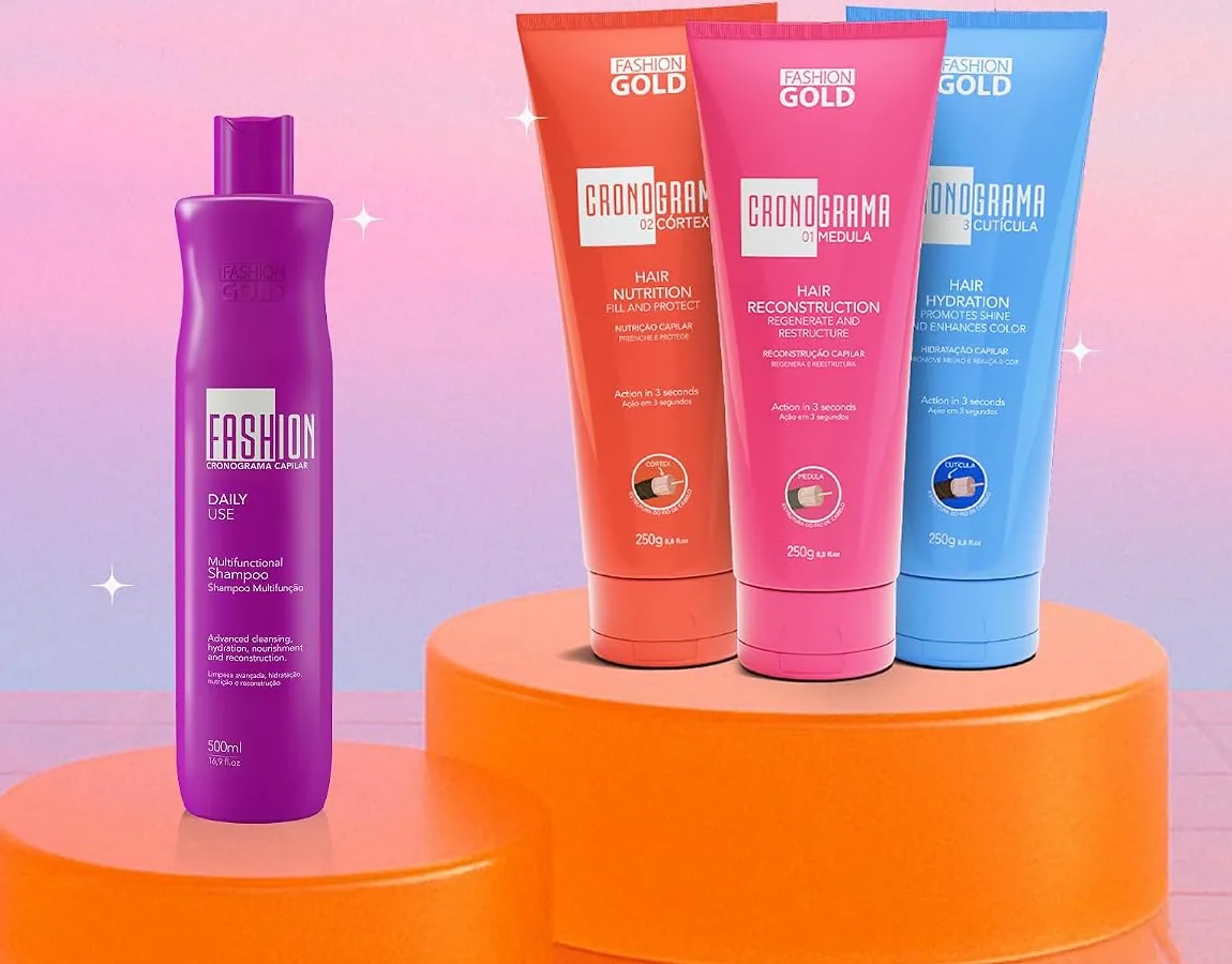 The purple Cronograma shampoo and the three Cronograma mask tubes on orange podiums